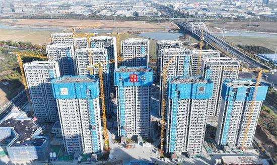 中铁<em>上海</em>局肥西紫云湖项目新型家园安置点 C区全面封顶