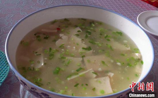 在新疆，一块豆腐何以名扬千里？
