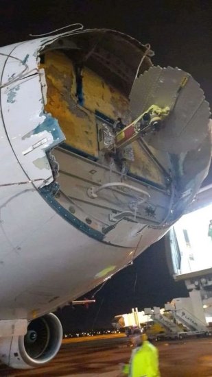 南美航空客机飞行中遭冰雹袭击紧急降落 机鼻被砸掉 挡风玻璃破裂