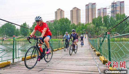 <em>天津</em>：“城市骑行”热度高 “骑行友好”环境加速打造